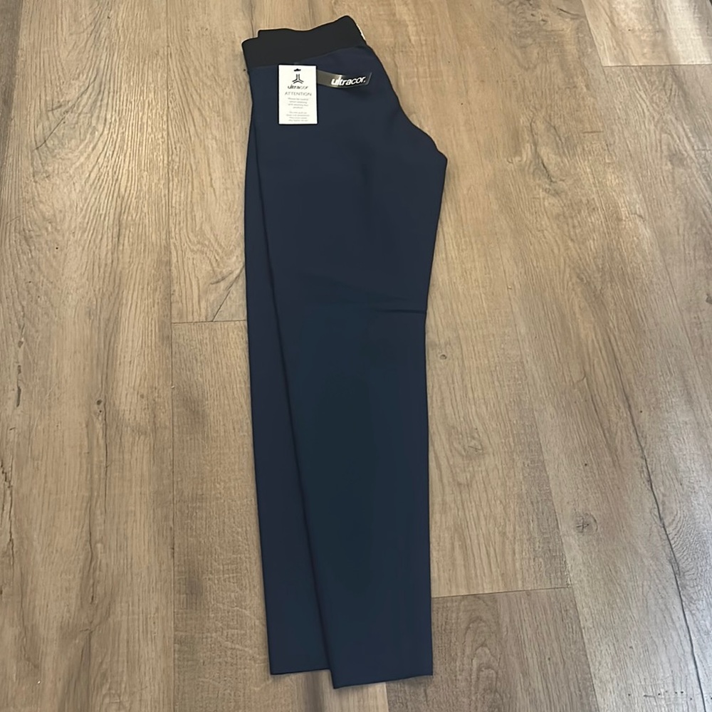 ULTRACOR Women's Navy leggings w/ lazer print detail SMALL BNWT